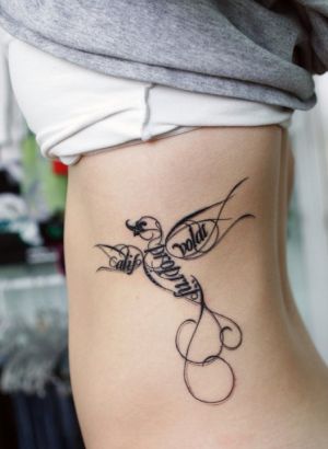 Text Tattoo Inked On Ribs